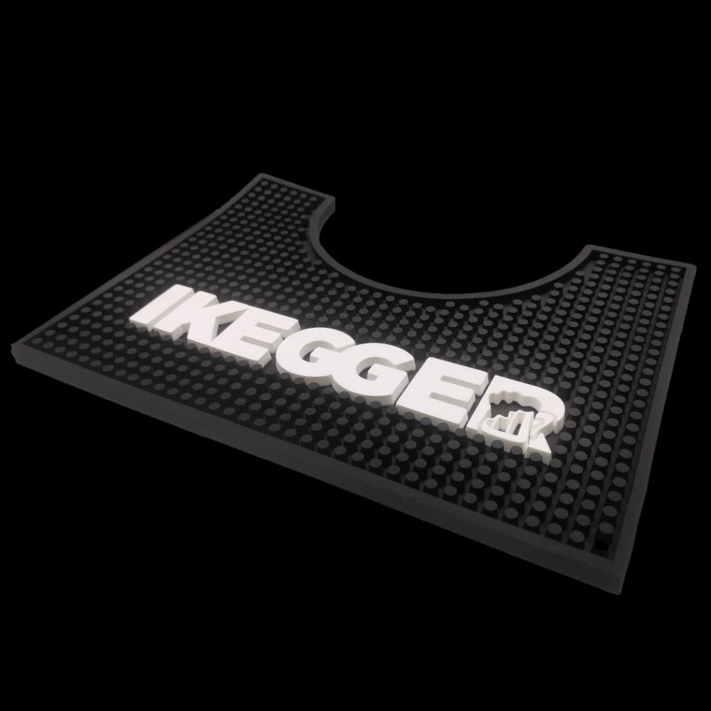 black rubber beer mat or drip tray